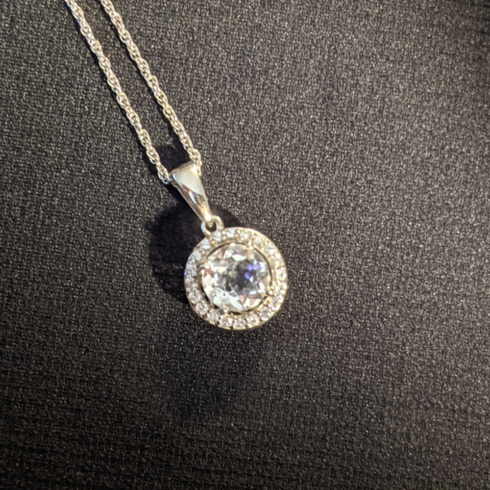 Simple, elegant White Topaz pendant with 925 silver chain.